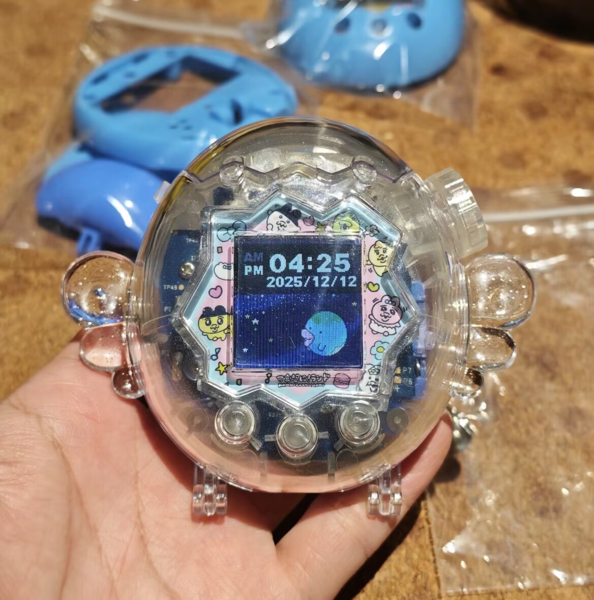 Bandai Model Tamagotchi - حافظة بتصميم جناح خيالي لجهاز تاماغوتشي