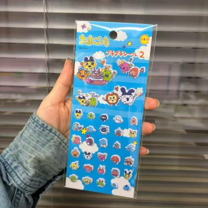 6 قطع ملصقات كرتونية على شكل ت - مراجعة Bandai Model Tamagotchi وسعره