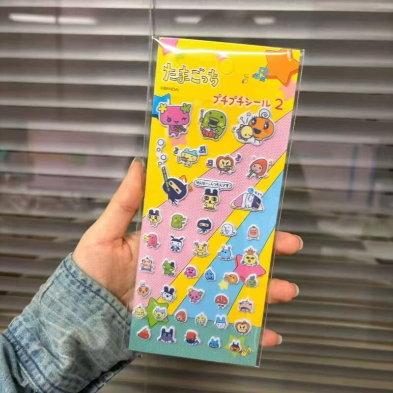 6 قطع ملصقات كرتونية على شكل ت - مراجعة Bandai Model Tamagotchi وسعره